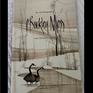 Book about artist P Buckley Moss.  Has a number of the artists works